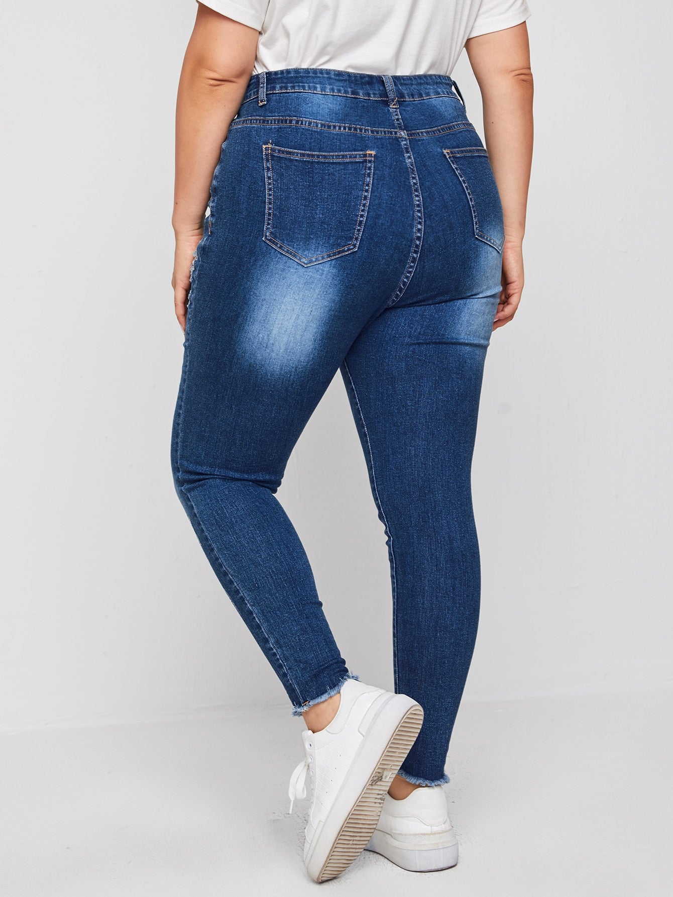 Plus High Stretch Ripped Raw Hem Fitted Jeans